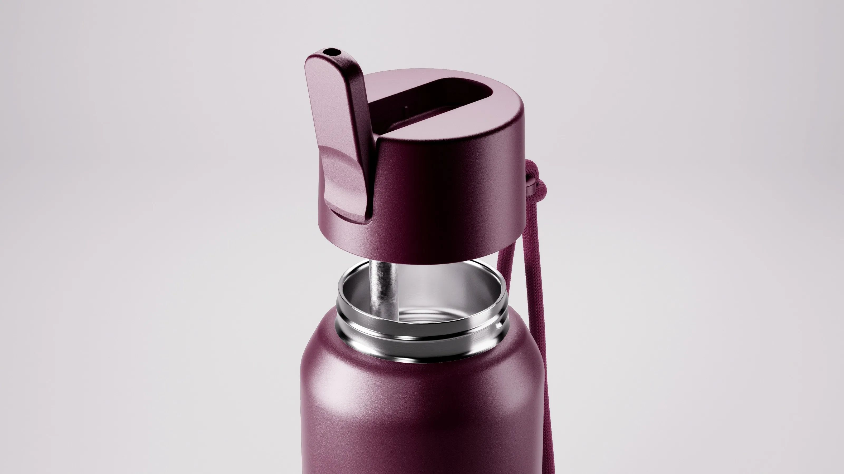 Close-up of a plum Fressko Core drink bottle, the sip lid lifted above its stainless steel neck