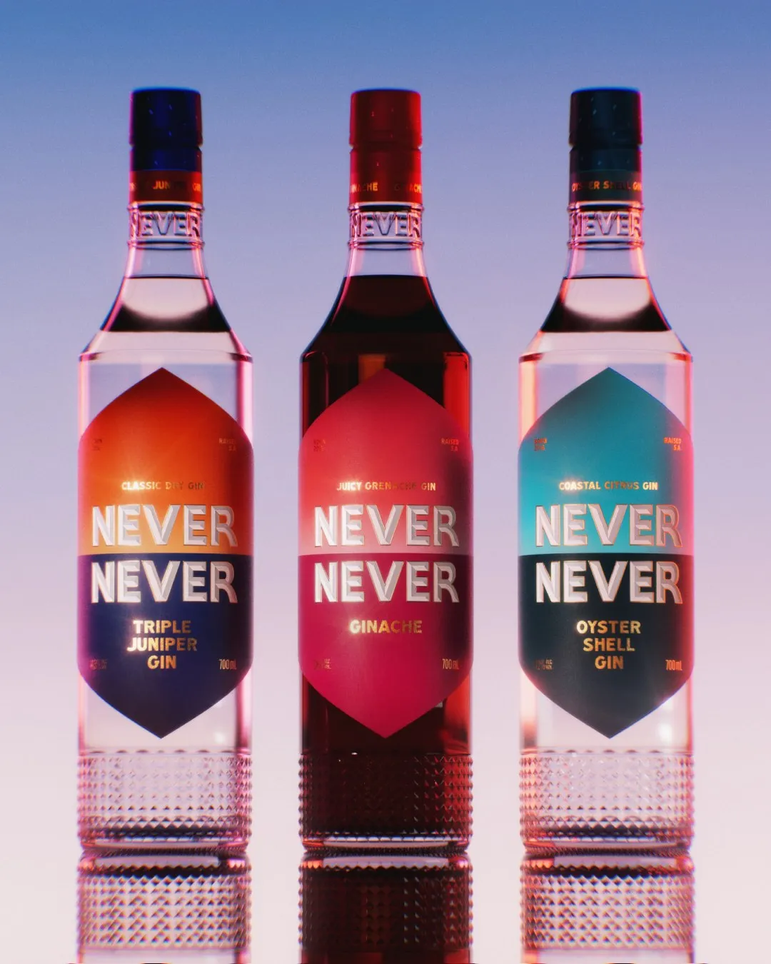 The Never Never gin range: Triple Juniper, Ginache and Oyster Shell bottles side by side