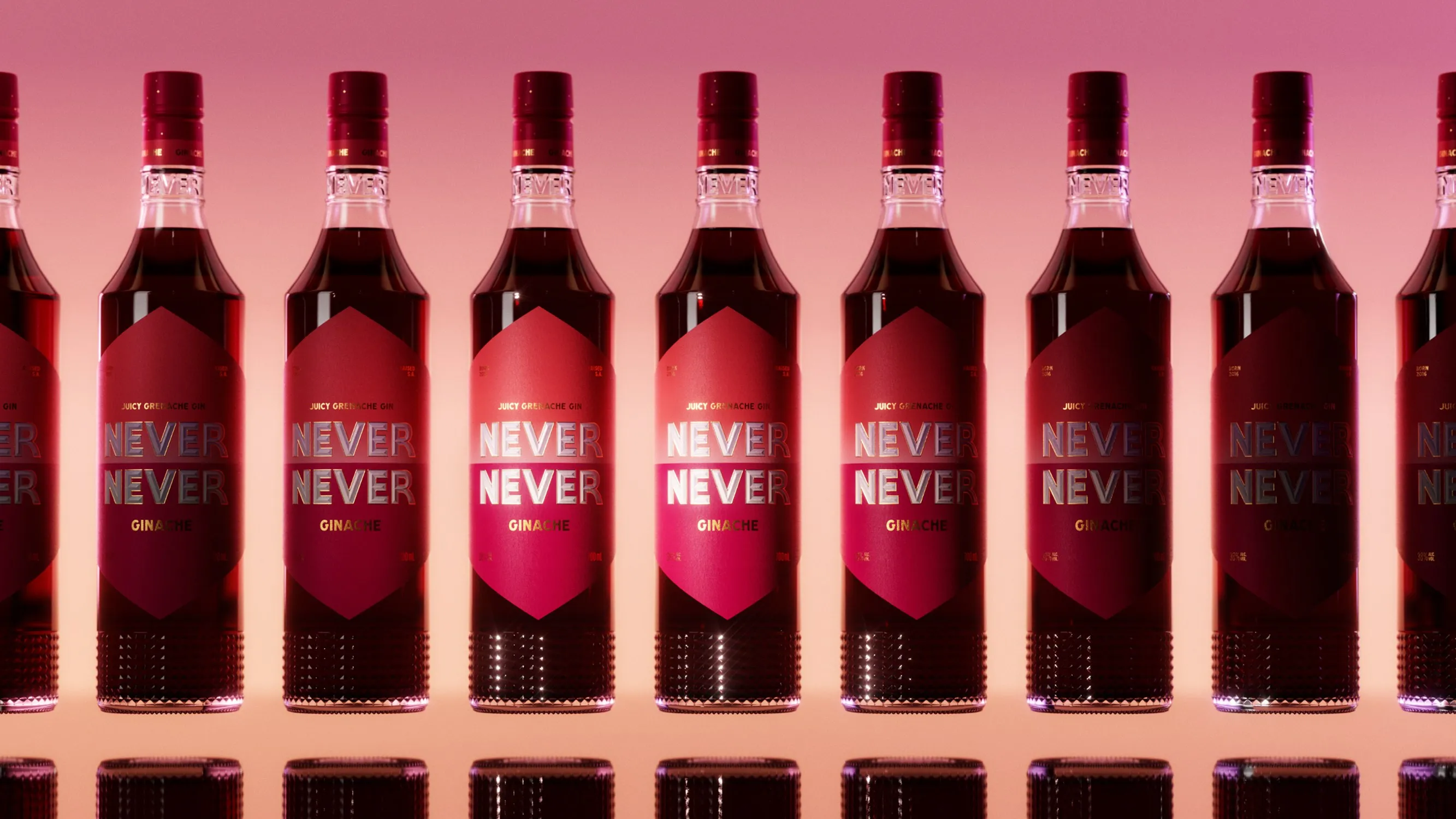 A row of Never Never Ginache bottles reflected on a glossy surface