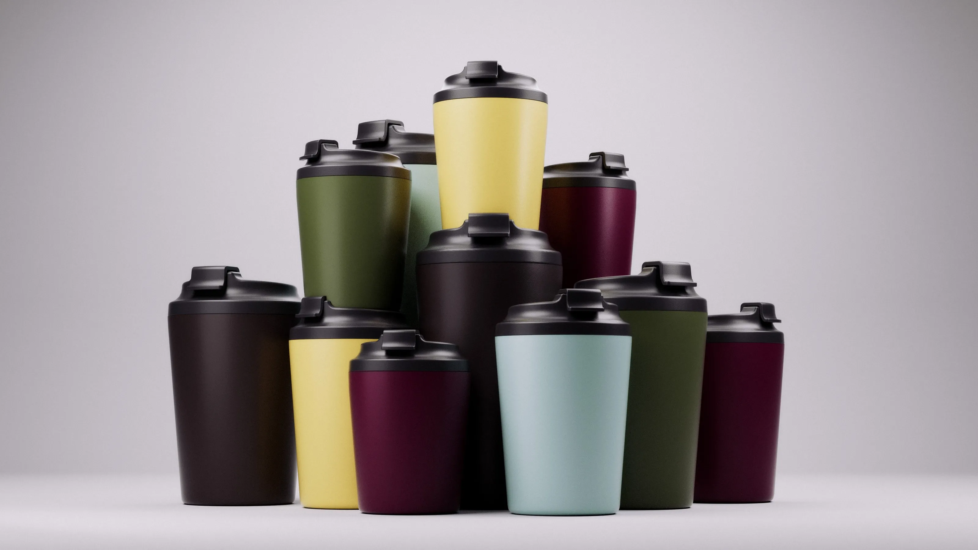 A stacked group of Fressko reusable coffee cups in yellow, green, plum, black and pale blue, shown alternately as a final render and a white clay render